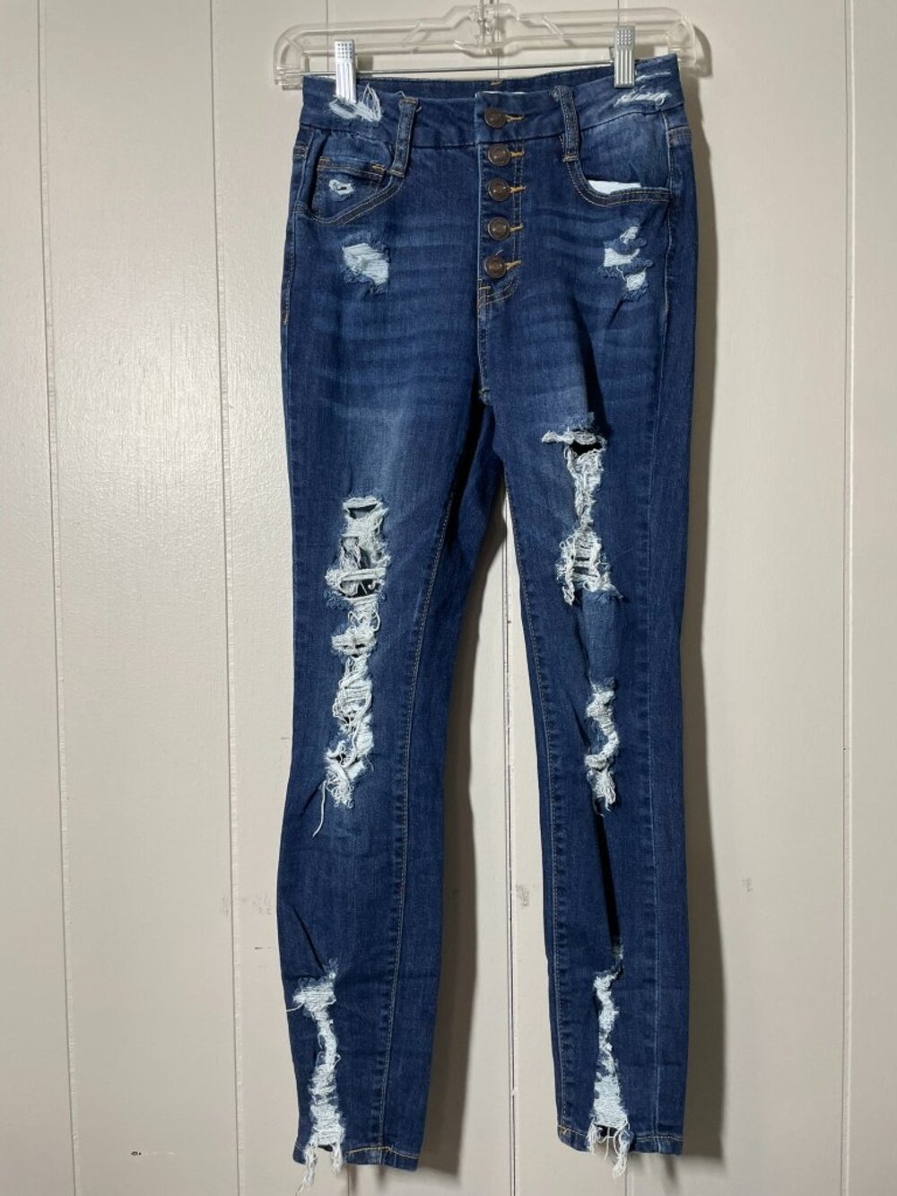 Rue 21 dark denim with lots of rips, skinny size 2